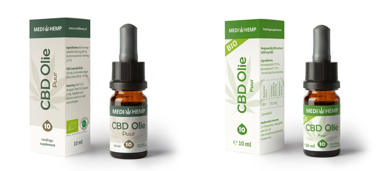 een flesje cbd olie naast een doosje cbd olie.
